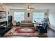 Inviting living room offers plenty of natural light and a cozy fireplace at 1297 Ascot Ter, Atlanta, GA 30329
