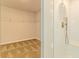Modern shower featuring white tile and wire shelving in closet at 1613 Fuma Leaf Way, Mcdonough, GA 30253