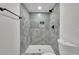 This bathroom boasts a large, modern shower with stylish green tile and sleek matte black fixtures at 3512 Hidden Acres Drive, Atlanta, GA 30340