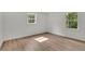 Bright bedroom with hardwood floors, large windows and natural light at 3512 Hidden Acres Drive, Atlanta, GA 30340