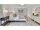 Bright main bedroom with large window overlooking yard at 3512 Hidden Acres Drive, Atlanta, GA 30340