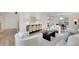 Bright living room with hardwood floors, neutral furniture, and ample natural light at 3512 Hidden Acres Drive, Atlanta, GA 30340
