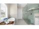 Bright bathroom featuring a garden tub, granite countertop, vanity, and a glass shower at 6252 Fernstone Trl, Acworth, GA 30101