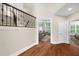 Beautiful foyer with hardwood floors and staircase at 6252 Fernstone Trl, Acworth, GA 30101