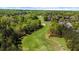 Scenic view of lush golf course and surrounding trees at 6252 Fernstone Trl, Acworth, GA 30101