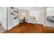 Upstairs landing area with hardwood floors, built-in desk, and cozy reading nook at 6252 Fernstone Trl, Acworth, GA 30101