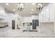 Bright kitchen featuring white cabinets, stainless steel appliances, and granite countertops at 6252 Fernstone Trl, Acworth, GA 30101