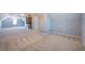 Huge bonus room with neutral carpet, built in shelves and under eave storage at 2361 Maplewood Ct # 25, Atlanta, GA 30339