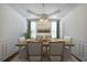 Elegant dining room with modern chandelier, table set, and light-filled windows at 2361 Maplewood Ct # 25, Atlanta, GA 30339