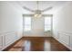 Bright dining room with modern chandelier and beautiful hardwood floors at 2361 Maplewood Ct # 25, Atlanta, GA 30339