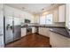 Modern kitchen features stainless steel appliances and dark countertops at 2361 Maplewood Ct # 25, Atlanta, GA 30339
