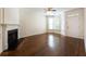 Bright living room with hardwood floors and a large window at 2361 Maplewood Ct # 25, Atlanta, GA 30339