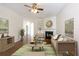 Inviting living room features a fireplace, hardwood floors, and stylish decor at 2361 Maplewood Ct # 25, Atlanta, GA 30339