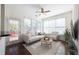 Cozy living room with neutral furniture, hardwood floors, a ceiling fan and natural light at 2361 Maplewood Ct # 25, Atlanta, GA 30339