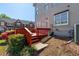A view of the back deck with red railings and a small yard, perfect for outdoor relaxation at 2361 Maplewood Ct # 25, Atlanta, GA 30339