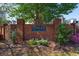Elegant brick entrance to Longleaf in Vinings with lush landscaping and a welcoming sign at 2361 Maplewood Ct # 25, Atlanta, GA 30339
