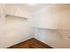Walk-in closet with wire shelving and wood floor at 2361 Maplewood Ct # 25, Atlanta, GA 30339
