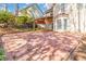 Brick patio and backyard for entertaining or relaxing at 2470 Suwanee Lakes Trl, Suwanee, GA 30024