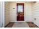 Elegant front door with glass detailing, offering a warm welcome and enhancing the home's entry appeal at 2470 Suwanee Lakes Trl, Suwanee, GA 30024