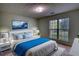 Bedroom featuring a queen bed, natural light, and neutral-colored walls at 260 Eastwood Forest, Covington, GA 30014