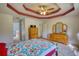 Spacious bedroom featuring carpet flooring, a dresser, and access to an ensuite bathroom at 260 Eastwood Forest, Covington, GA 30014