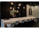 Modern bar area featuring a sleek countertop, comfortable seating, chic lighting, and beverage station at 3324 Peachtree Ne Rd # 1518, Atlanta, GA 30326