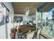 Open-concept living space showcasing a dining room that flows into the kitchen and living area with a balcony at 3324 Peachtree Ne Rd # 1518, Atlanta, GA 30326