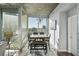 Bright dining room with modern chandelier, large windows, and city views at 3324 Peachtree Ne Rd # 1518, Atlanta, GA 30326