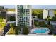 High-rise condo building featuring an outdoor pool and an exterior view of the unit highlighted at 3324 Peachtree Ne Rd # 1518, Atlanta, GA 30326