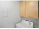Bright laundry room with washer and dryer hookups and overhead cabinets at 3324 Peachtree Ne Rd # 1518, Atlanta, GA 30326