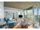 Inviting living room with hardwood floors, a comfortable seating area, and floor-to-ceiling windows overlooking the city at 3324 Peachtree Ne Rd # 1518, Atlanta, GA 30326