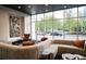 Inviting lounge area features a sectional sofa, stylish decor, and expansive windows offering bright natural light at 3324 Peachtree Ne Rd # 1518, Atlanta, GA 30326