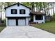 Lovely two-story home with a two-car garage and freshly painted exterior at 3867 Cherie Glen Rd, Snellville, GA 30039