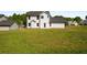 Expansive backyard offers ample space for outdoor activities and potential landscaping opportunities at 960 Revere Way, Hampton, GA 30228