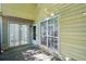 Cozy patio with sliding glass doors and natural lighting at 1066 Rock Creek Ln, Norcross, GA 30093