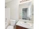 Standard bathroom featuring a bath, sink, and medicine cabinet at 1066 Rock Creek Ln, Norcross, GA 30093