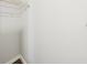 A closet space with a wire shelf, ready for organized storage at 1066 Rock Creek Ln, Norcross, GA 30093