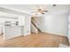 Spacious living room featuring open layout and wood-look flooring at 1066 Rock Creek Ln, Norcross, GA 30093