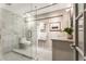 Modern bathroom features a glass shower, marble tile, and updated vanity at 1570 Dekalb Ne Ave # F, Atlanta, GA 30307