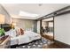 Spacious bedroom features hardwood floors, skylights, and modern decor with accent wall at 1570 Dekalb Ne Ave # F, Atlanta, GA 30307
