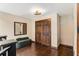 A bonus room area with hardwood floors, a closet, and a bench at 1570 Dekalb Ne Ave # F, Atlanta, GA 30307