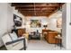 Living room with concrete floors, exposed ceiling, accent furniture, and modern art at 1570 Dekalb Ne Ave # F, Atlanta, GA 30307