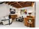 Living room with concrete floors, exposed ceiling, accent furniture, and modern art at 1570 Dekalb Ne Ave # F, Atlanta, GA 30307