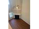 Spacious living room with hardwood floors, fireplace, and large windows at 2127 Manhattan Pkwy, Decatur, GA 30035