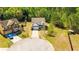 Aerial view of a home on a cul-de-sac, showcasing its location, lawn, and landscaping at 2365 Oakland Trail Way, Lawrenceville, GA 30044