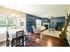 Open floor plan blending living and dining areas, featuring hardwood floors and comfortable seating at 2365 Oakland Trail Way, Lawrenceville, GA 30044