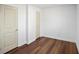 Bedroom featuring hardwood floors, and doors at 2541 Peyton Woods Sw Trl, Atlanta, GA 30311
