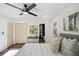 Inviting main bedroom features neutral décor, ceiling fan, and an en-suite bathroom at 2541 Peyton Woods Sw Trl, Atlanta, GA 30311