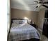 Bedroom featuring a bed, a dresser, and natural light from a window at 278 Mission Oak Se Dr, Grayson, GA 30017