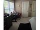 Bedroom with study desk, window views, and a neutral color scheme at 278 Mission Oak Se Dr, Grayson, GA 30017